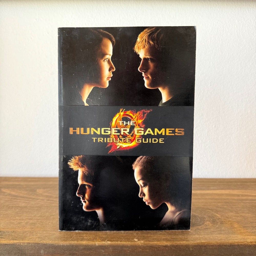 Scholastic The Hunger Games Tribute Guide Official Movie Tie-In Paperback Book